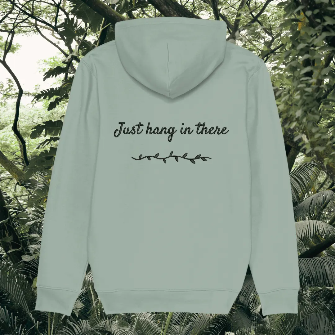 Back view of Mindful Earth Sloth Hoodie in Aloe Green with “Just Hang in There” design – Eco-Friendly Organic Cotton Unisex Hoodie Made in the UK