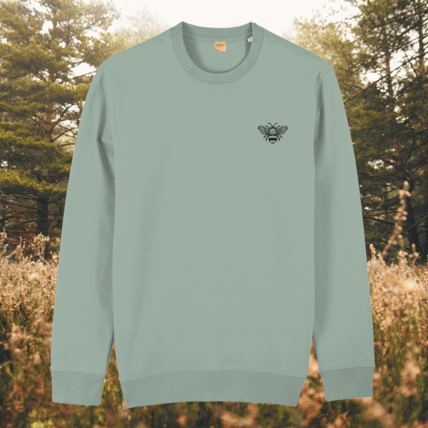 Bee design on Aloe green organic cotton sweater with the quote “Believe in Yourself” – MindfulEarth, front view.