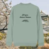 Back of the aloe green organic cotton sweater with the words “Let Your Dreams Blossom” in floral style – Mindful Earth UK sustainable fashion