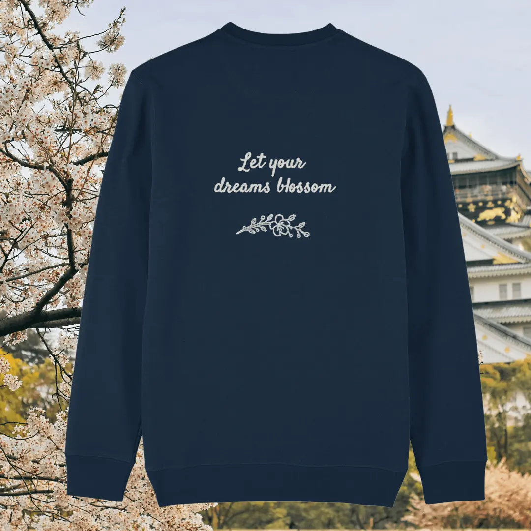 Back of the French Navy organic cotton sweater featuring the quote “Let Your Dreams Blossom” in floral style – Mindful Earth UK sustainable fashion