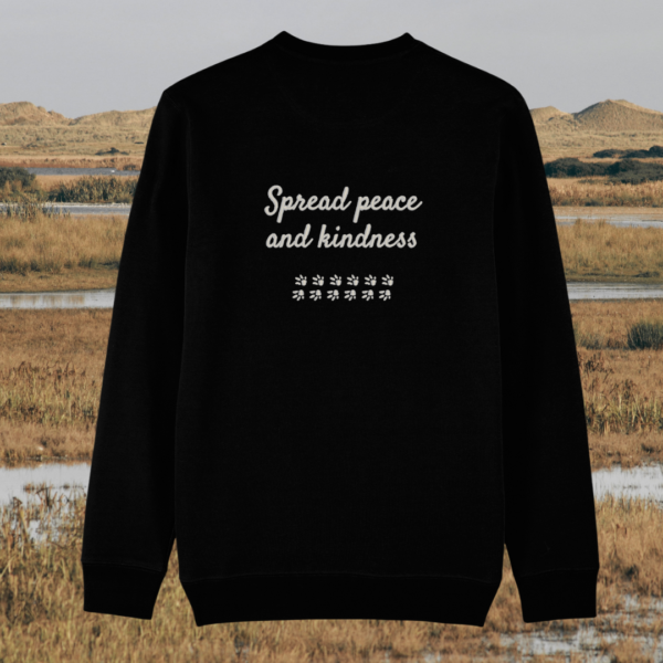 Back view of the Capybara Black organic cotton sweater with a minimalist plain back by Mindful Earth.
