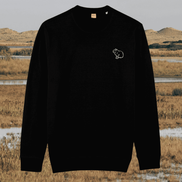 Front view of the Capybara Black organic cotton sweater featuring the “Spread Peace and Kindness” design by Mindful Earth.