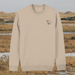 Front view of the Capybara Desert Dust organic cotton sweater featuring the “Spread Peace and Kindness” design by Mindful Earth.