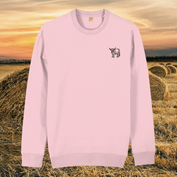 Front view of the Highland Cow Cotton Pink organic cotton sweater featuring the “Live Like Someone Left the Gate Open” design by Mindful Earth.