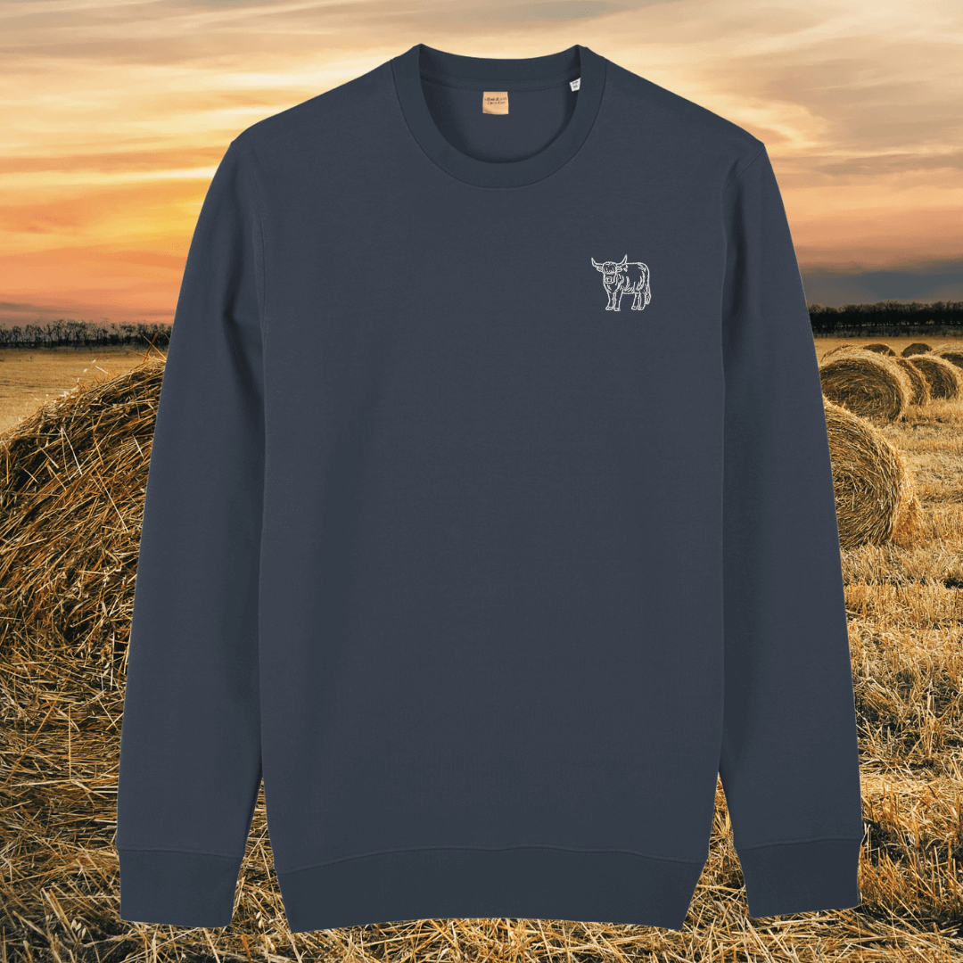 Front view of the Highland Cow India Ink Grey organic cotton sweater featuring the “Live Like Someone Left the Gate Open” design by Mindful Earth.