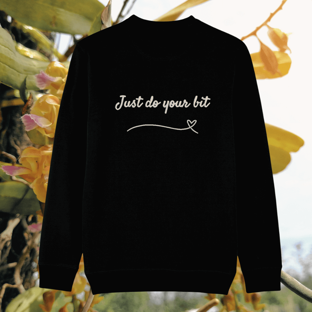 Back of the black organic cotton sweater featuring hummingbird illustration and the phrase “Just Do Your Bit” – Mindful Earth UK sustainable fashion
