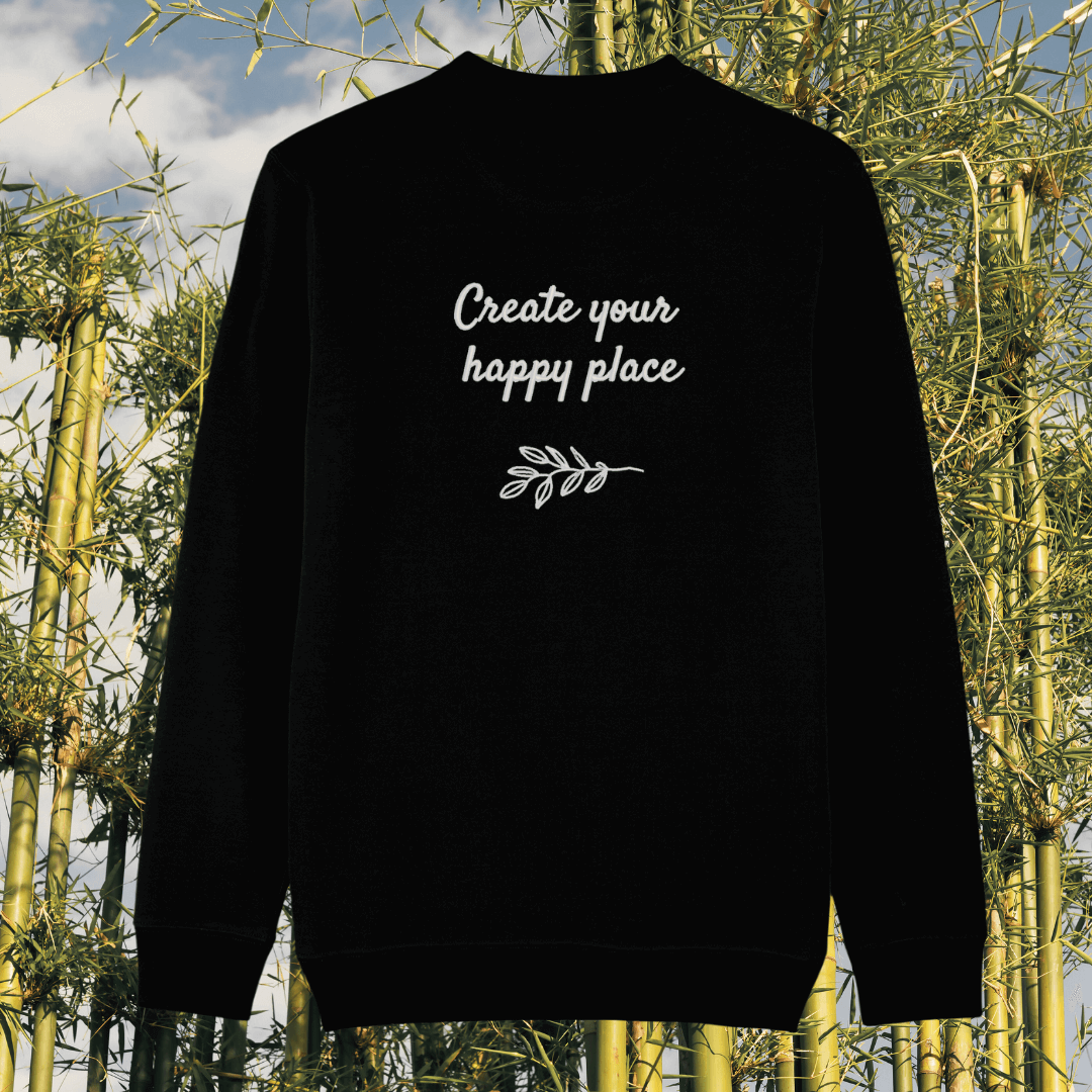 Back view of the Koala Black organic cotton sweater with a minimalist plain back by Mindful Earth.