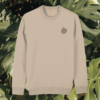 Front view of the Monstera Desert Dust organic cotton sweater featuring the “Life’s a Climb but the View is Great” design by Mindful Earth.