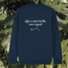 Back view of the Monstera French Navy organic cotton sweater with the “Life’s a Climb but the View is Great” print by Mindful Earth.