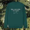 Back of the Glazed Green organic cotton sweater featuring monstera leaf illustration and the phrase “Life’s a Climb but the View Is Great” – Mindful Earth UK sustainable fashion