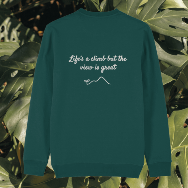 Back of the Glazed Green organic cotton sweater featuring monstera leaf illustration and the phrase “Life’s a Climb but the View Is Great” – Mindful Earth UK sustainable fashion