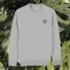 Front view of the Monstera Heather Grey organic cotton sweater featuring the “Life’s a Climb but the View is Great” design by Mindful Earth.