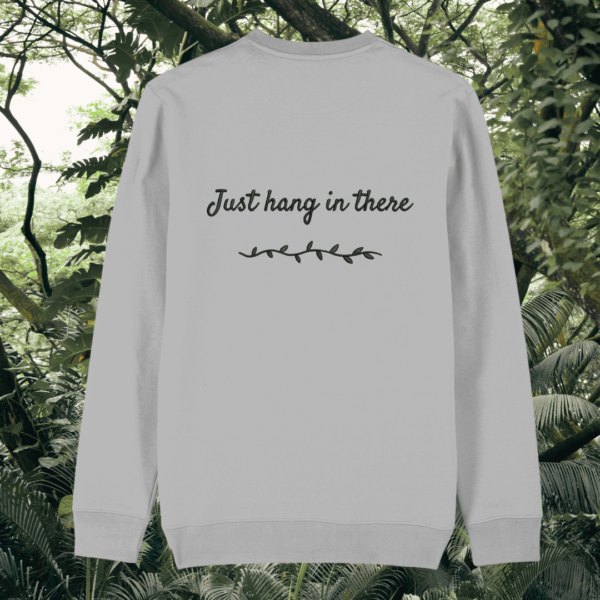 Back of the Heather Grey organic cotton sweater featuring sloth illustration and the phrase “Just Hang In There” – Mindful Earth UK sustainable fashion