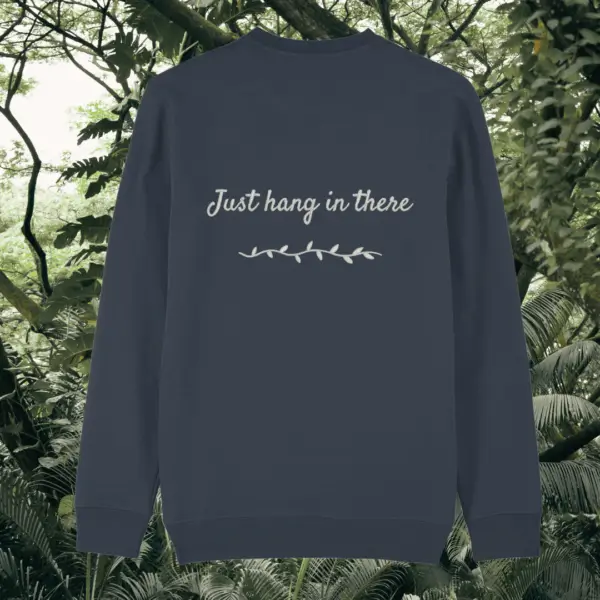 Back of the India Ink Grey organic cotton sweater featuring sloth illustration and the phrase “Just Hang In There” – Mindful Earth UK sustainable fashion