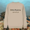 Back of the Desert Dust organic cotton sweater featuring turtle illustration and the phrase “Embrace the Journey” – Mindful Earth UK sustainable fashion