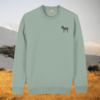 Aloe green organic cotton sweater with zebra print design and motivational “Dare to Be Different” message on the front – Mindful Earth sustainable UK clothing