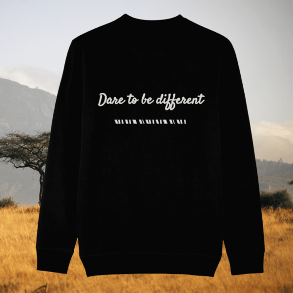 Back of the black organic cotton sweater with zebra print detail and “Dare to Be Different” inspirational design – Mindful Earth UK sustainable fashion