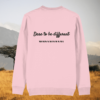 Back of the Cotton Pink organic cotton sweater with zebra print detail and “Dare to Be Different” inspirational design – Mindful Earth UK sustainable fashion