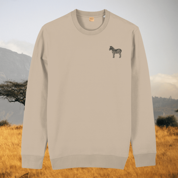 Desert Dust organic cotton sweater with zebra print design and motivational “Dare to Be Different” message on the front – Mindful Earth sustainable UK clothing