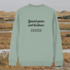 Capybara Spread Peace and Kindness organic cotton sweater back in Aloe